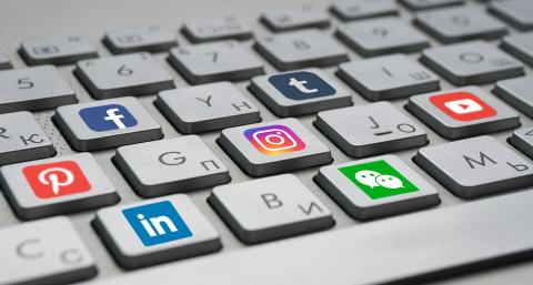 A keyboard featuring different social media logos