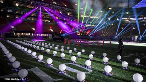 Rows of paper lanterns atop drones on field prior to Super Bowl LIII