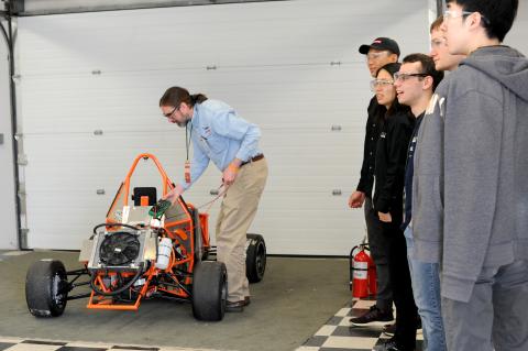 photograph of HyTech Racing vehicle undergoes electrical inspection
