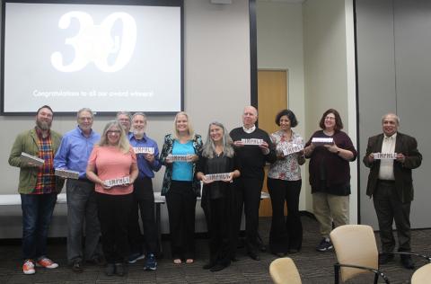 Pictured left-right: Clint Zeagler, Russ Clark, Laurie Baird, Keith Edwards, Matt Sanders, Melody Moore Jackson, Carrie Bruce, Dick Henneman, Neha Kumar, Heather Pritchett, and Ashok Goel