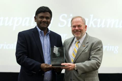 Raghupathy Sivakumar with Executive Vice President for Research Steve Cross