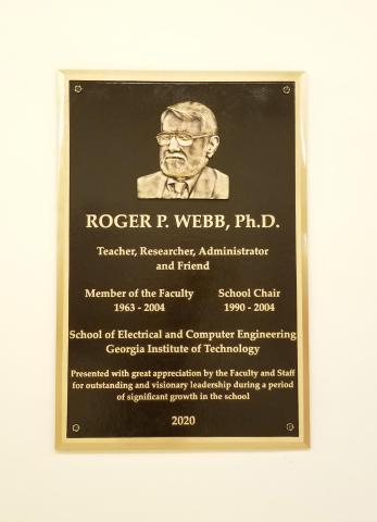 plaque installation in honor of Roger Webb