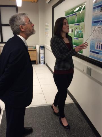 Dr. John P. Holdren interacting with students.