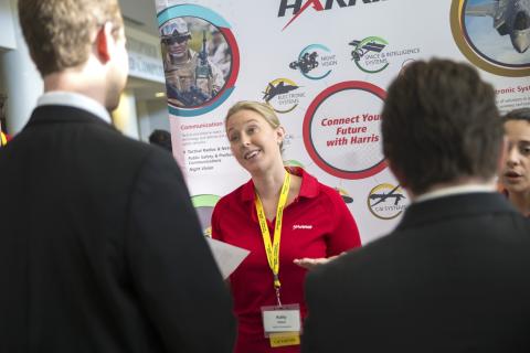 Recruiter talks to students at Georgia Tech Career Fair