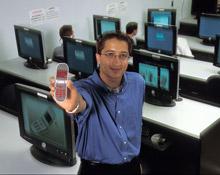 Anish Buch presents his innovative phone.