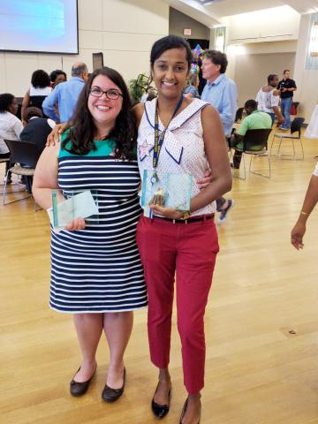 Kristen Laquidara (left) and Rose Brito (right) holding their Georgia Tech College of Engineering Staff Awards