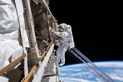 Astronaut Luca Parmitano is pictured tethered to the International Space Station while finalizing thermal repairs on the Alpha Magnetic Spectrometer.