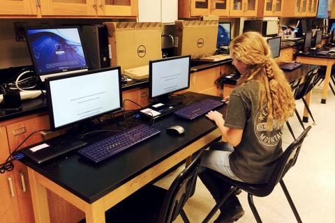 Kathrine Udell setting up experiment