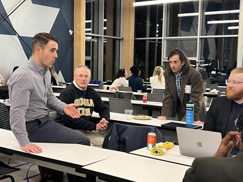 Representatives of non-profits and Georgia Tech discuss sustainability problems.