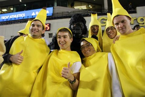 Chen, third from left, posing in his banana suit at the 2011 Homecoming game
