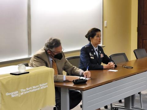 Adam Stulberg takes notes as Lt. General Nina Armagno talks to the Sam Nunn School of International Affairs.