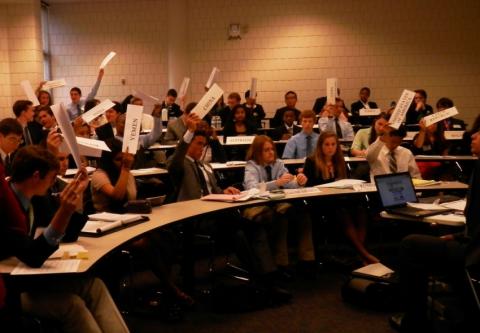 Delegates of the General Assembly 1st Committee vote to move into a moderated caucus.