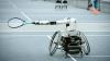 A tennis robot being developed at Georgia Tech set to return a ball hit towerd it from a human player