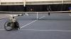 Tennis robot being developed at Georgia Tech on court returning ball across the net