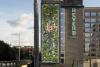 Reverb building with art installation on side