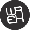 WREK in white letters on a black circle