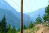 High-voltage power lines, like this one in North Cascades National Park in Washington state, often cross rugged terrain in areas in which it isn’t easy to bury a power line, or for firefighters to reach. Philippe Gerber/Moment via Getty Images