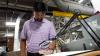 This image shows Sean Madhavaraman, one of GaMEP's leaders, working at Silon's plant in Peachtree City, Georgia