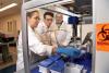   Researchers, from left, Lorena Chaves, Jose Assumpcao, and Philip Santangelo will be part of a collaborative effort to use mRNA drugs to enhance the body’s immune response. Santangelo is leading the $24 million project supported by the federal Advanced Research Projects Agency for Health. (Photo: Jack Kearse)