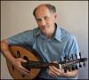 David Marcus holding the OUD instrument.