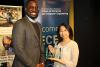 Mitsuko Ito (right) receiving the COESCAC Culture Champion Award from Damon Williams, associate dean for inclusive excellence in the College of Engineering.