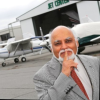 Dr. Krishan Ahuja "shushes" jet engine noise.