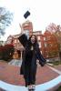 Kendra Garcia wearing cap and gown at Tech Tower