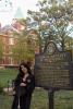 Kendra Garcia next to the Georgia Tech plaque. 