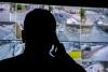 A dispatcher answers a call inside the Georgia Tech Police Department's Emergency Communications and Operations Center.