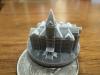 3D printed Tech Tower sitting on a coin