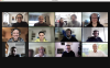 A screenshot of a video conference with 12 people