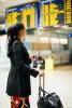 Female traveler in airport.