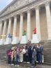 Group photo in front of building.