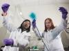 Senior Research Scientist Eric Shen (left) and Principal Research Scientist Anna Österholm (right) demonstrate how films of electrochromic polymers can be applied to large surfaces.