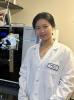 young woman in lab coat