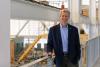 Tim Lieuwen standing above one of the Strategic Energy Institute's (SEI) research areas. 