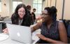Hernandez (left) interacts with a participant in the program Pursuing Urban Sustainability at Home, a camp she helped facilitate.