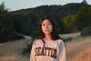 woman in sweatshirt in field