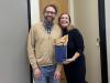 Michael Best, executive director of IPaT, presents Gillian Hayes with a gift bag before her IPaT distinguished alumnus talk on Oct. 17, 2024