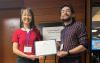 Callie Hao and ECE Ph.D. candidate Stefan Abi-Karam with the Best Paper Award.