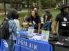 Georgia AIM representatives talk with students on Georgia Tech's campus during the launch event for their new mobile labs.