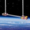 a rendering of two CubeSats in space, beaming light