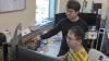 Tao Lu, a Ph.D. student at the School of Interactive Computing, with Assistant Professor Yalong Yang