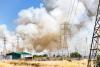 Smoke cloud rising from a brush wildfire burning in East San Francisco Bay Area, California
