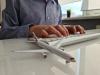 Person books plane ticket online.