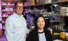 Brandon Dixon and Shao-Yun Hsu pose in their lab, where they're working on a project to improve lymph node transplant surgery.