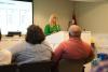 This picture shows Betsy McGriff of Georgia Tech's Center for Economic Development Research  speaking to residents in Pembroke, Georgia, about expected housing growth due to the nearby Hyundai auto plant