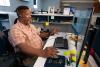 ASC employee helps customer with questions.