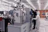 Student working with IMS staff in the fabrication cleanroom