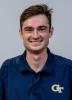 young man in blue shirt